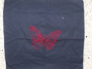 butterfly embroidered cushion